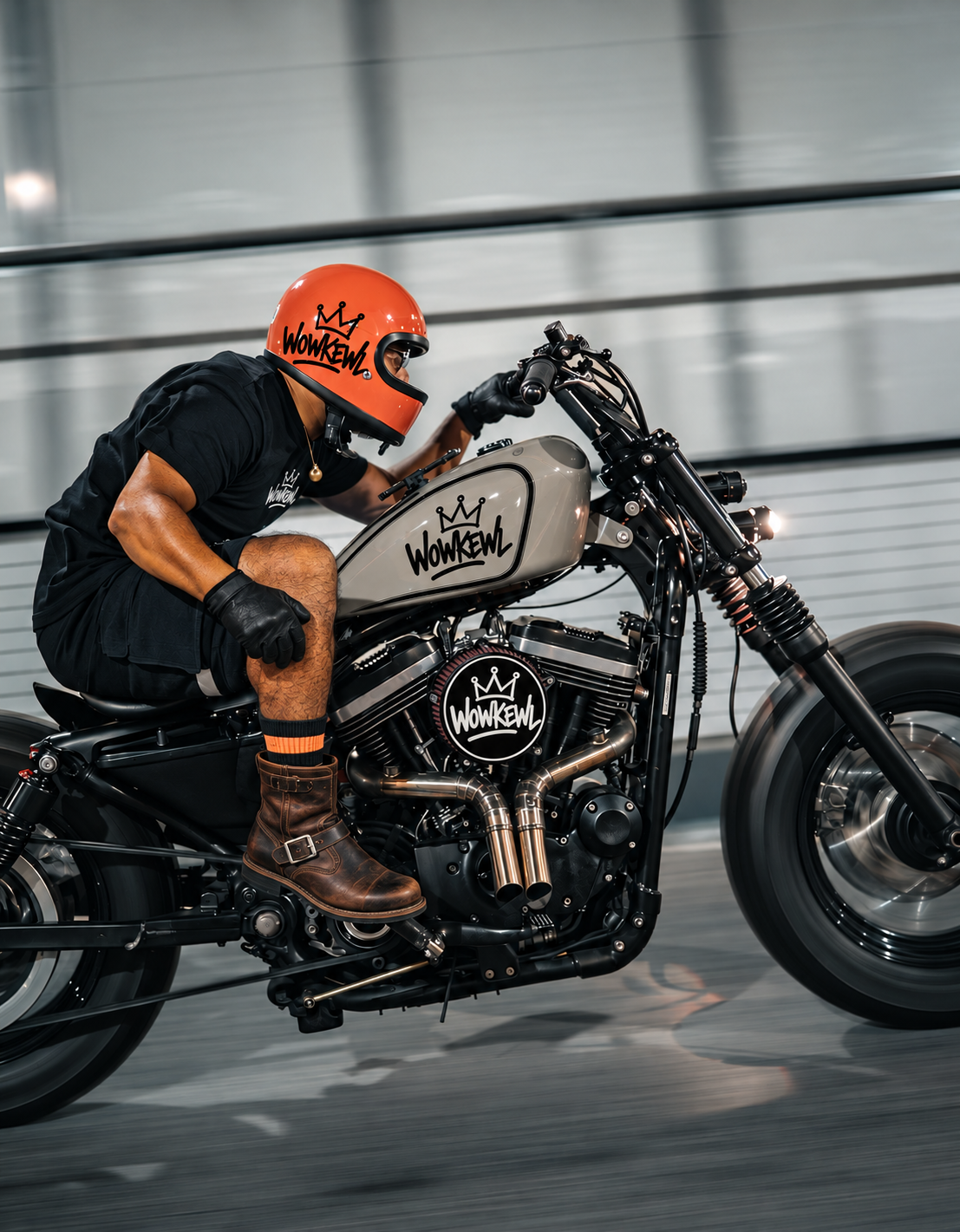 Motorcyclist wearing WOWKEWL, with Crown details on the helmet and motorcycle